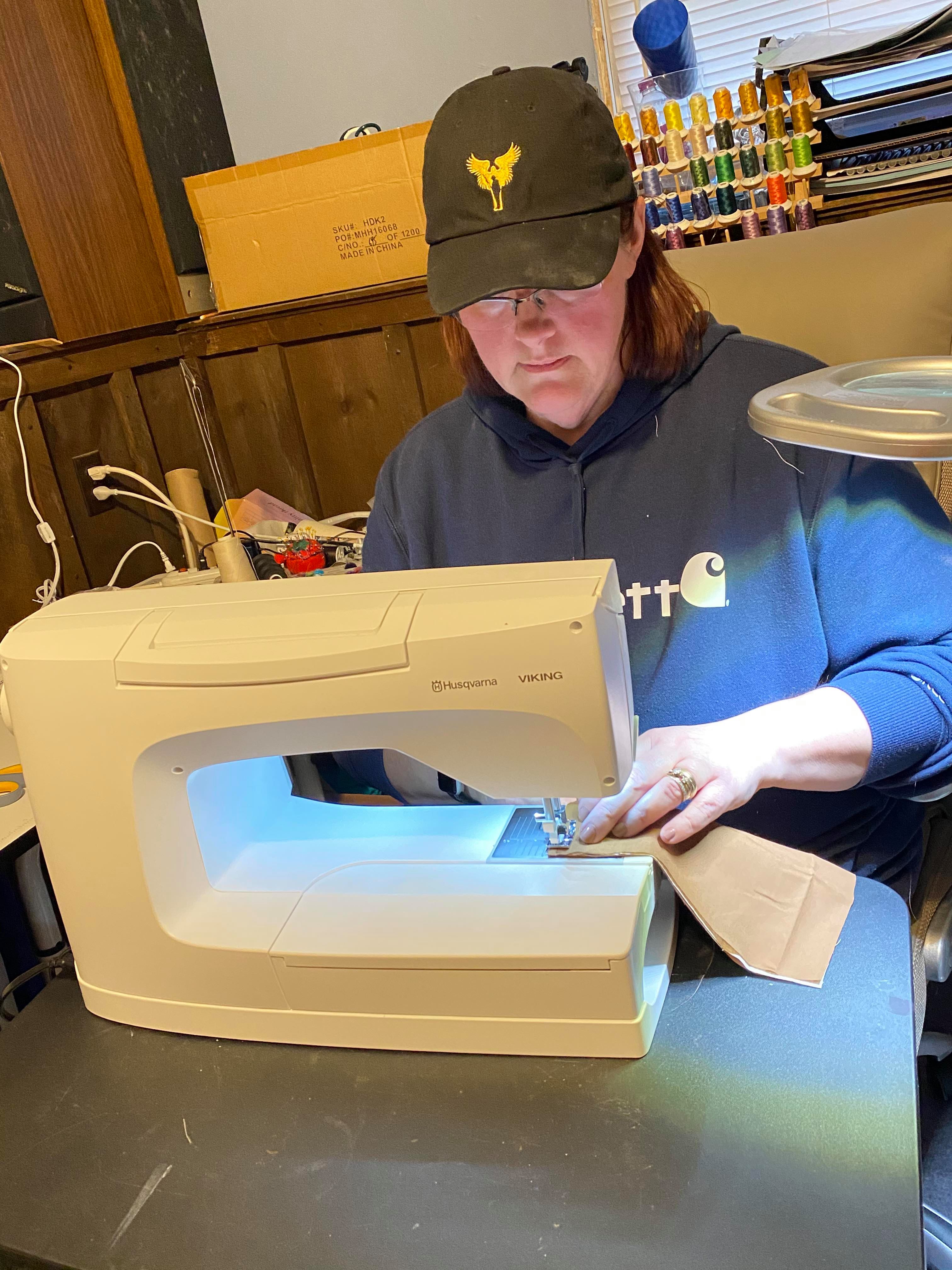 Soldiers' Angels Sewing Face Masks for Troops Soldiers' Angels Volunteer Sews Face Mask for Deployed Troops