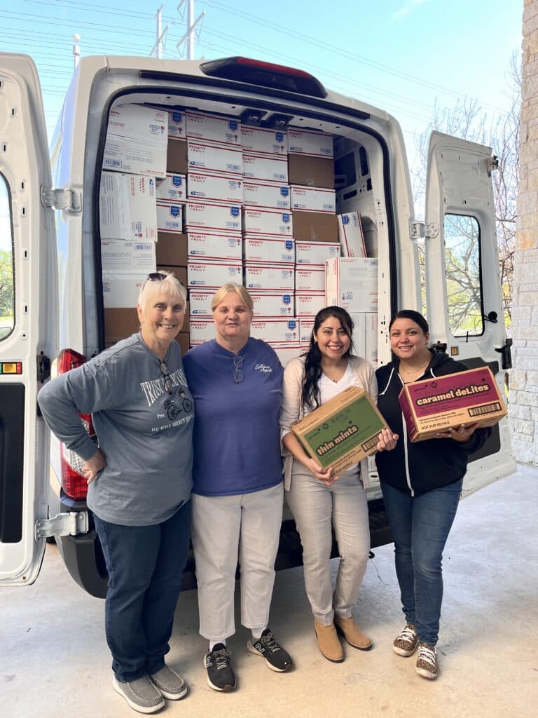 Carepackages filled with Girl Scout Cookies