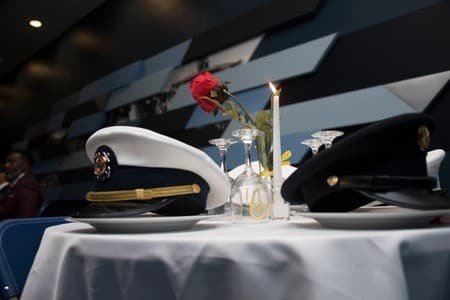 The Missing Man Table—sometimes called the Fallen Comrade Table—is a symbolic tribute found in military dining spaces. Every item placed on it carries deep meaning, representing the sorrow, respect, and remembrance we hold for those who are missing, captured, or gave their lives in service.