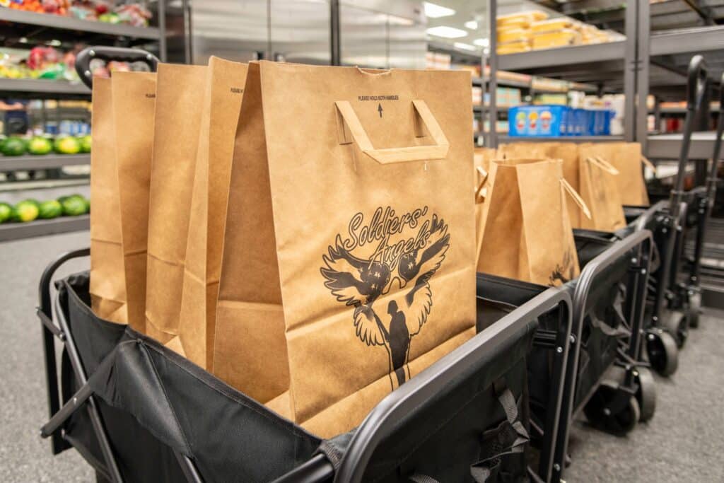 Soldiers' Angels brown paper bags ready to fill with food