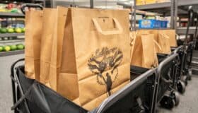 Soldiers' Angels brown paper bags ready to fill with food